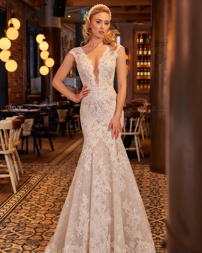 https://www.callablanche.com/public/media/images/product/800/279/LA22234-Lace%20Cap%20Sleeve%20Wedding%20Dress%20with%20Mermaid%20Silhouette%20and%20Plunging%20Neckline1.jpg